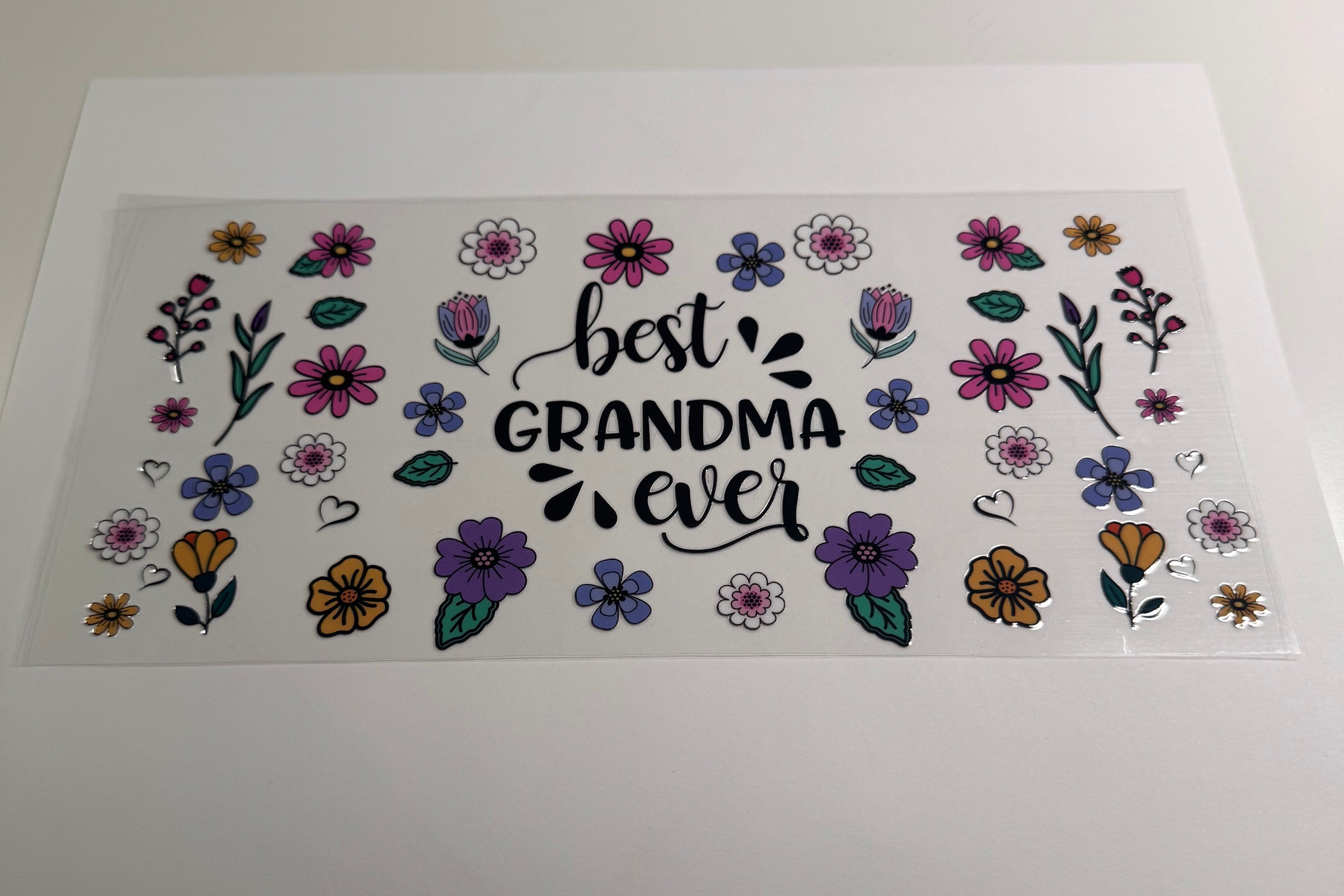 wrap with 'Best Grandma Ever' text and floral designs 